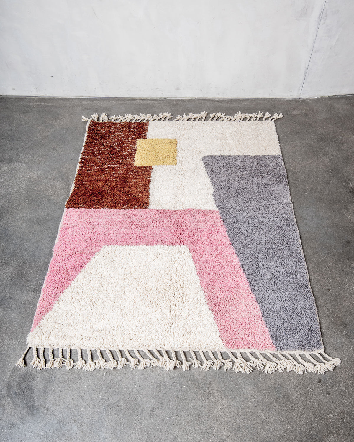 Modern, designer, handcrafted Berber rug from Morocco. Beniourain carpet with beautiful colours and patterns and fluffy wool texture.